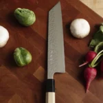 Kikuichi 67-Layer Damascus Tsuchime Gyuto Chef Knife 9.5″ – Mirror Finish Japan Steel - Image 3